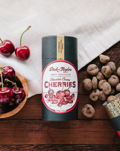 A tube of chocolate coated cherries.